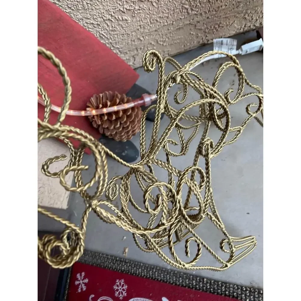 Two wrought iron Christmas Reindeer Gold filigree decorations